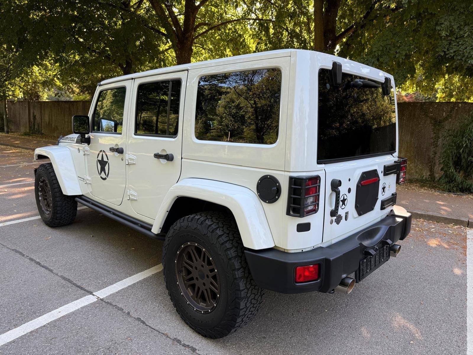 Jeep Wrangler Unlimited Sport 3.6 V6 284ch - 1 ère main - Carnet entretien - Toit ouvrant - Sièges chauffants