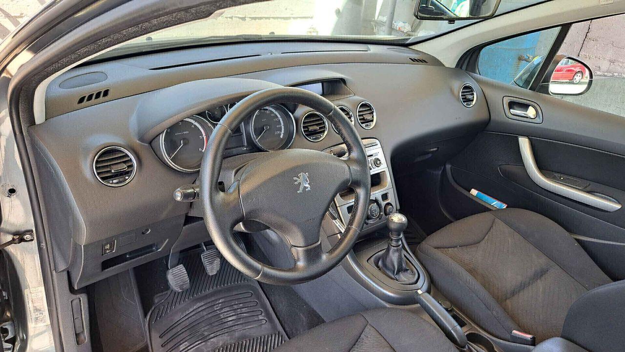 Peugeot 308 2009 — photo 12