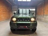 Suzuki Jimny Ranger Lim. 1.3 KAT Metallic+AHK+1. HAND+ - gebrauchte Suzuki Jimny aus dem Jahr 2011