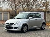 Suzuki Swift Lim. Club KLIMA TÜV NEU 5-TÜRIG - silberne Suzuki Swift