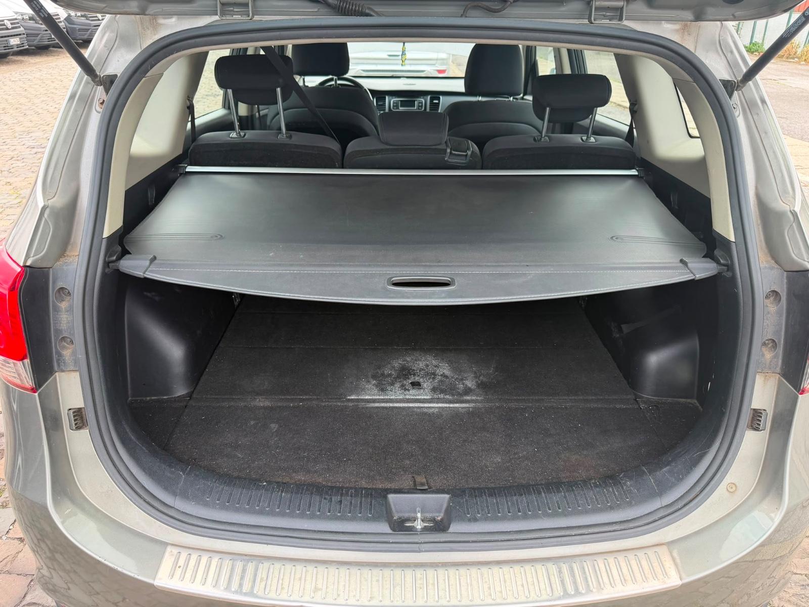 Kia Carens 2014 — photo 12