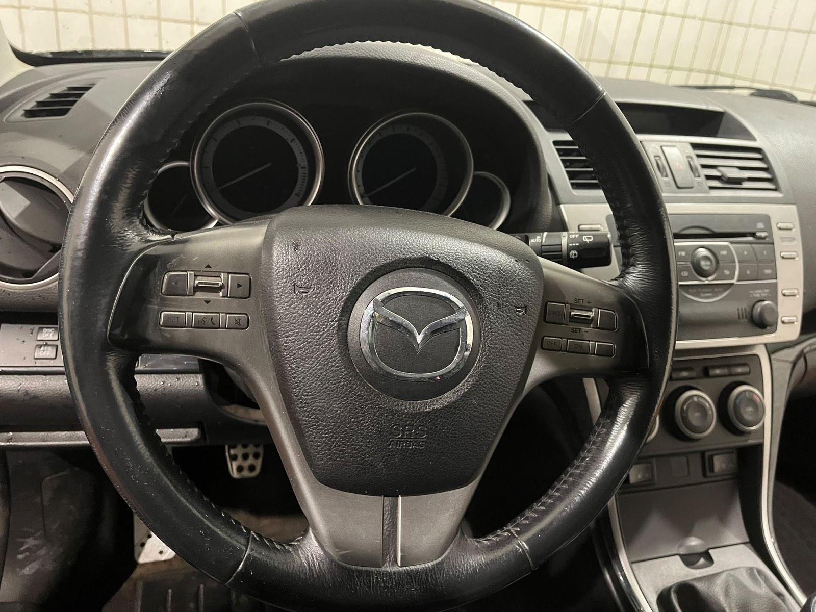 Mazda 2 2008 — photo 8