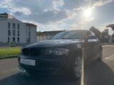 BMW 1-er 118i Lim.*NAVI*BLUETOOTH*PDC*SITZHEIZUNG - gebrauchte BMW 118 aus dem Jahr 2008