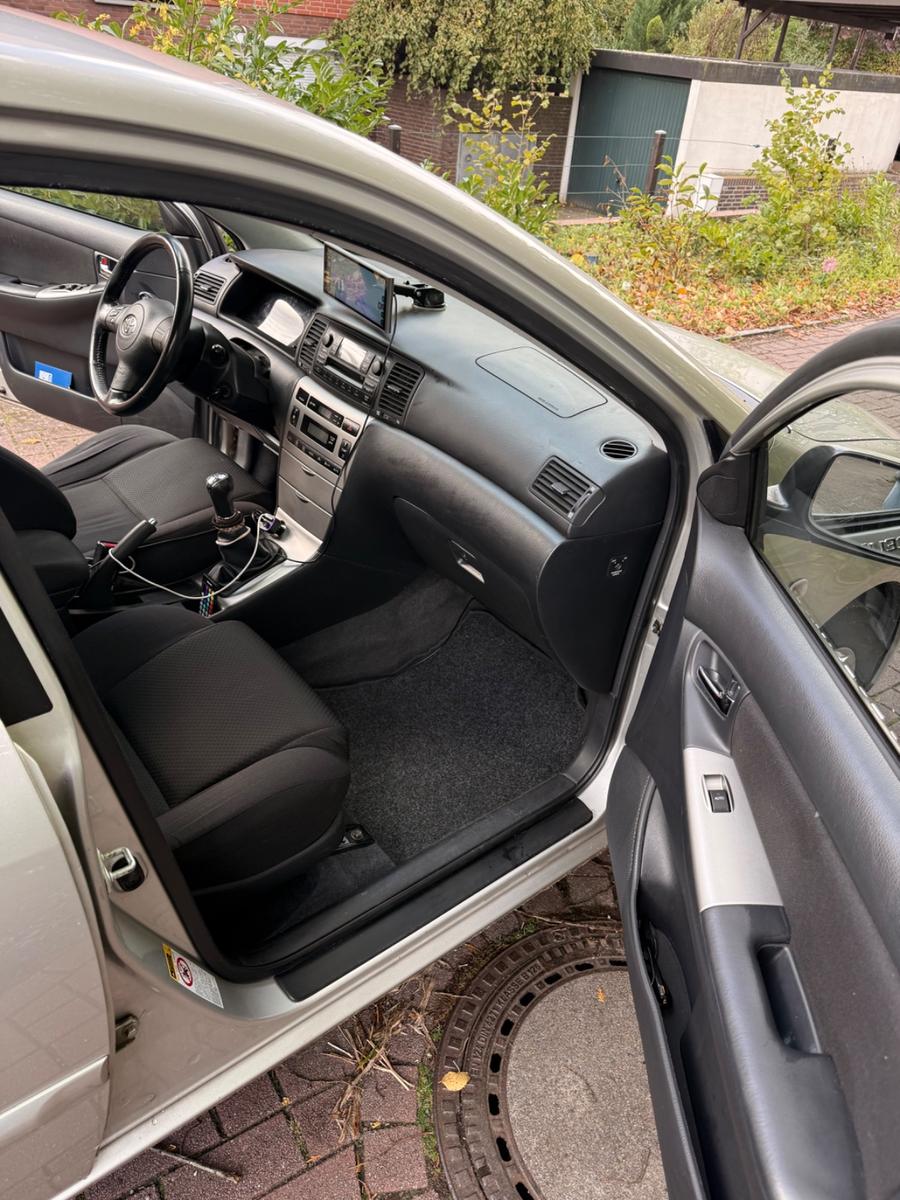 Toyota Corolla 2004 — photo 6
