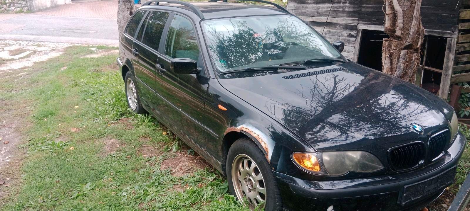 BMW 316 2004 — rear view