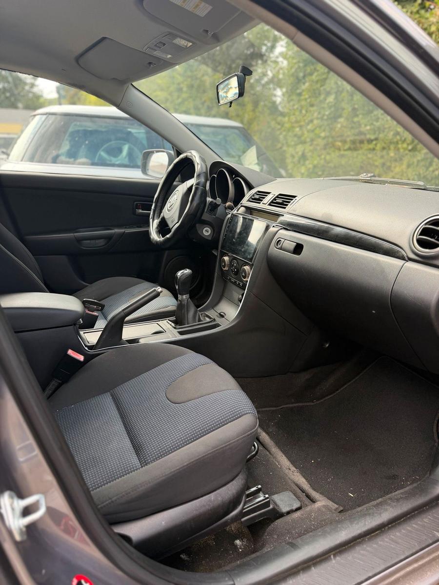 Mazda 3 2004 — photo 8