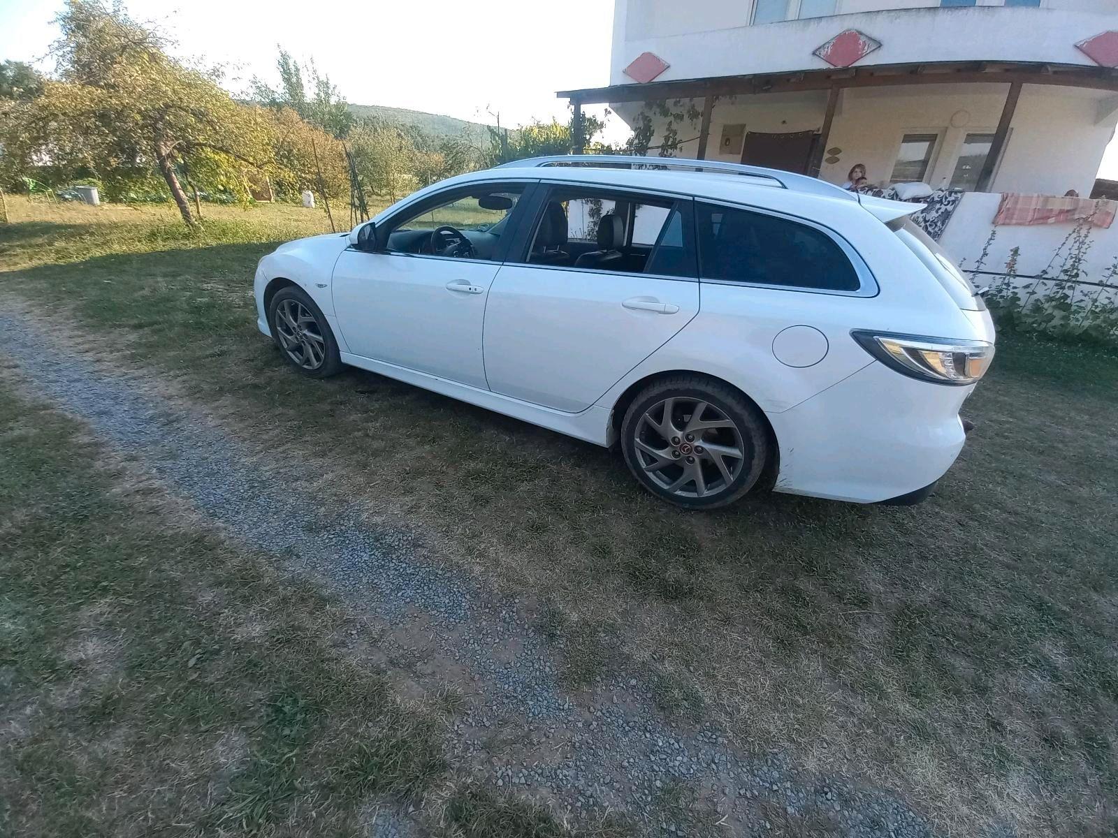 Mazda 2 2012 — photo 8