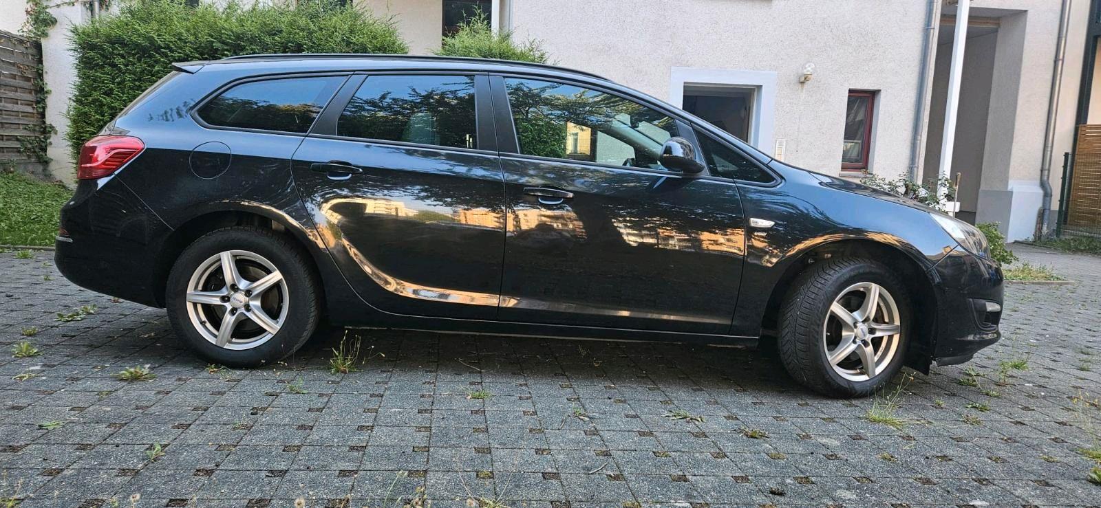 Opel Astra 2014 — engine 165 HP (121kW)