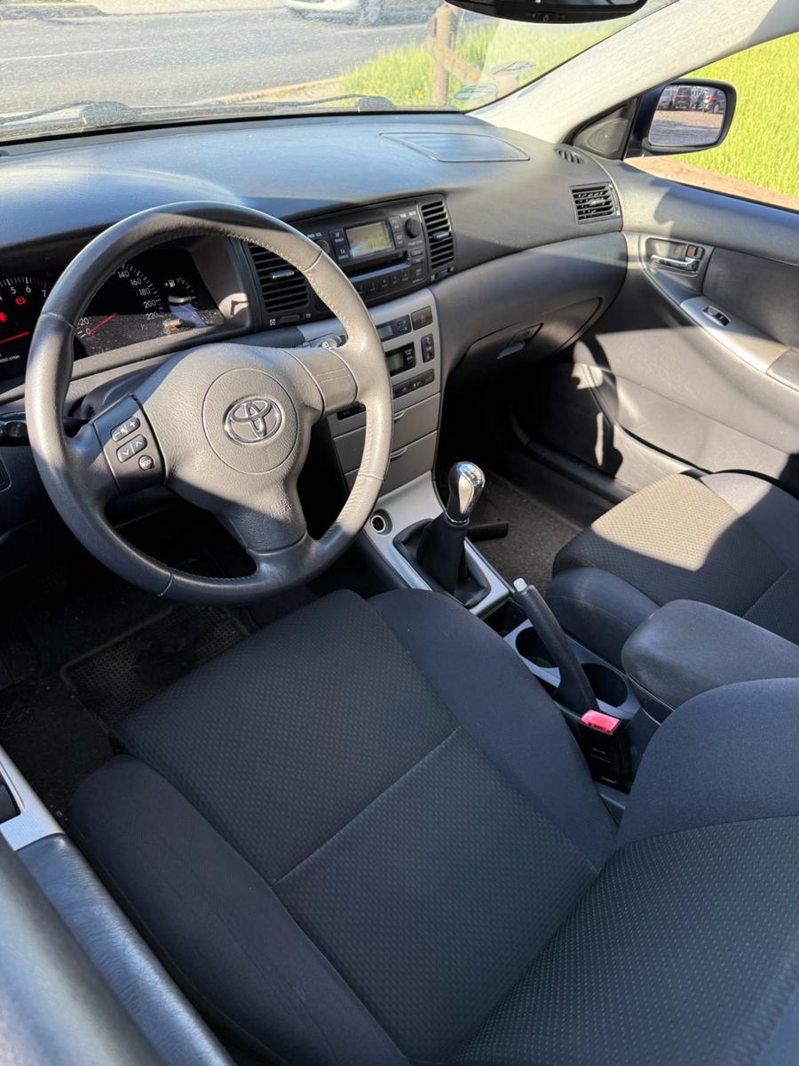 Toyota Corolla 2004 — photo 9