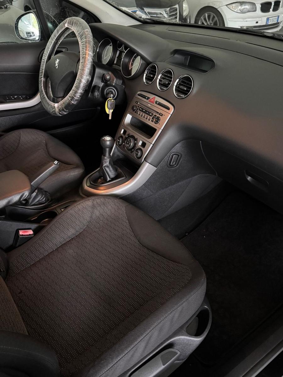 Peugeot 308 2009 — photo 8
