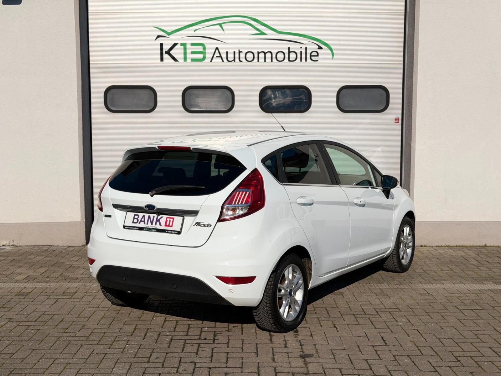 Ford Fiesta Titanium*RFK*NAVI*VOLL CHECKHEFT*SZH*MFL*