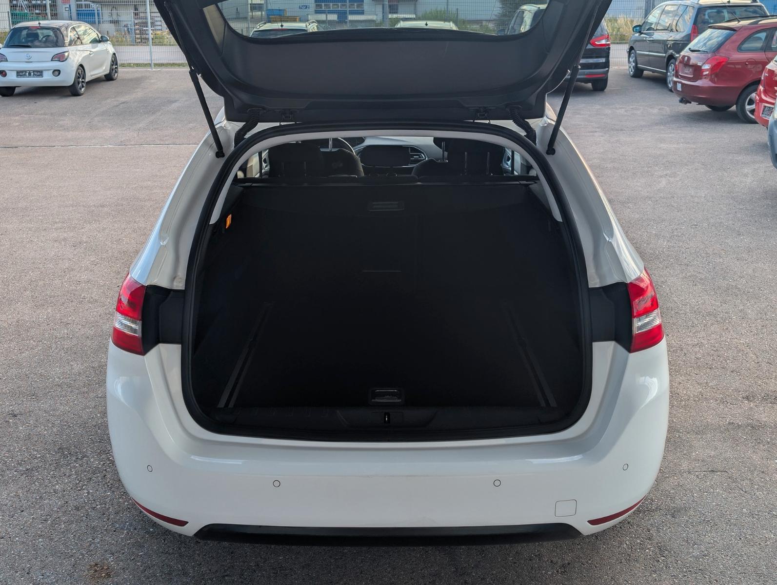 Peugeot 308 2014 — photo 25