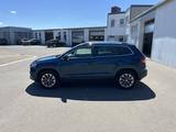 Skoda Karoq 1.5 TSI DSG Clever Navi RFK 4xSHZ LR-Hzg F - blaue Skoda Karoq